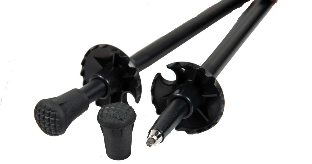 Tiger Paw trekking poles carbide tips and oversized black rubber baskets for mud, snow, and trail protection by Mons Peak IX