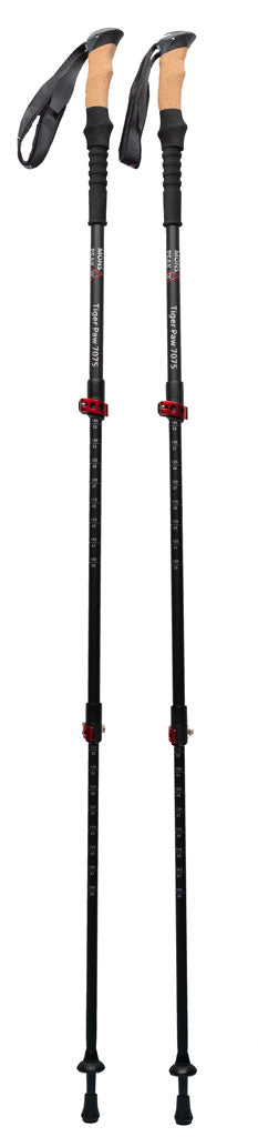 Mons Peak IX Tiger Paw Z carbon fiber trekking poles fully extended with natural cork grips, black shafts, red quick-lock adjustment collars, black wrist straps, and carbide tips with mud/snow baskets