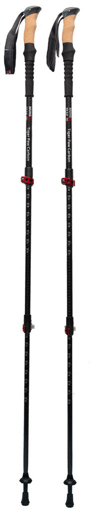 Mons Peak IX Tiger Paw Z carbon fiber trekking poles fully extended with natural cork grips, black shafts, red quick-lock adjustment collars, black wrist straps, and carbide tips with mud/snow baskets